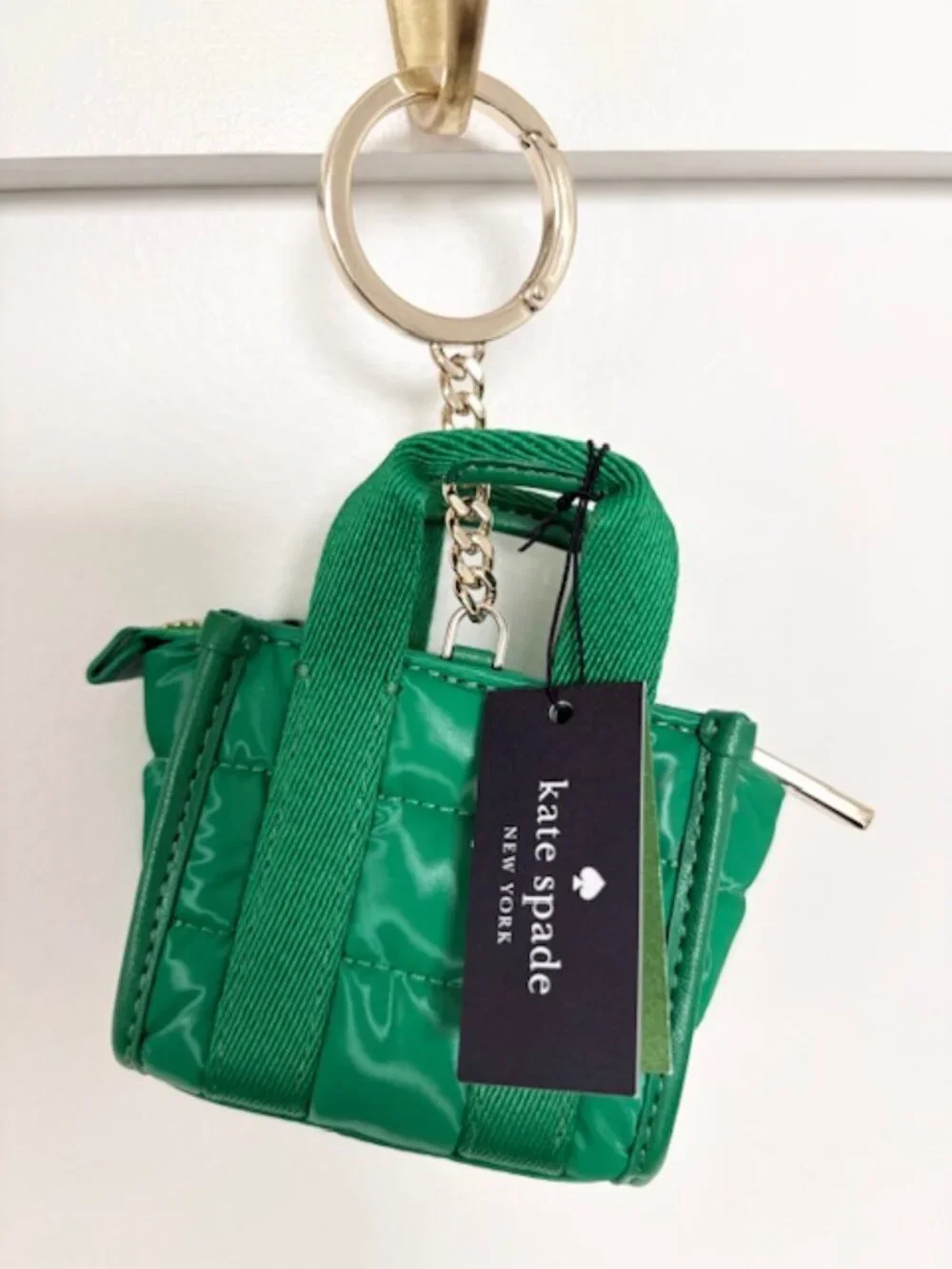 kate spade green quilted mini tote keychain with gold hardware